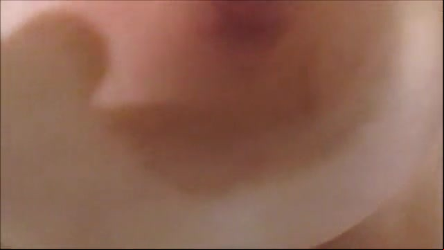 Big ass wife stripping and playing with a dildo